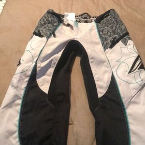 Fly racing over the boot riding pants